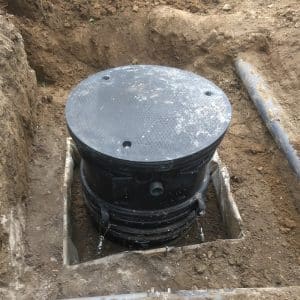 lestage béton en périphérie de la fosse de relevage