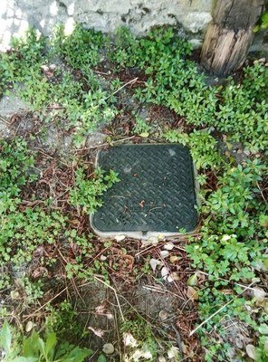 Trappe d'ouverture d'un regard eaux usées